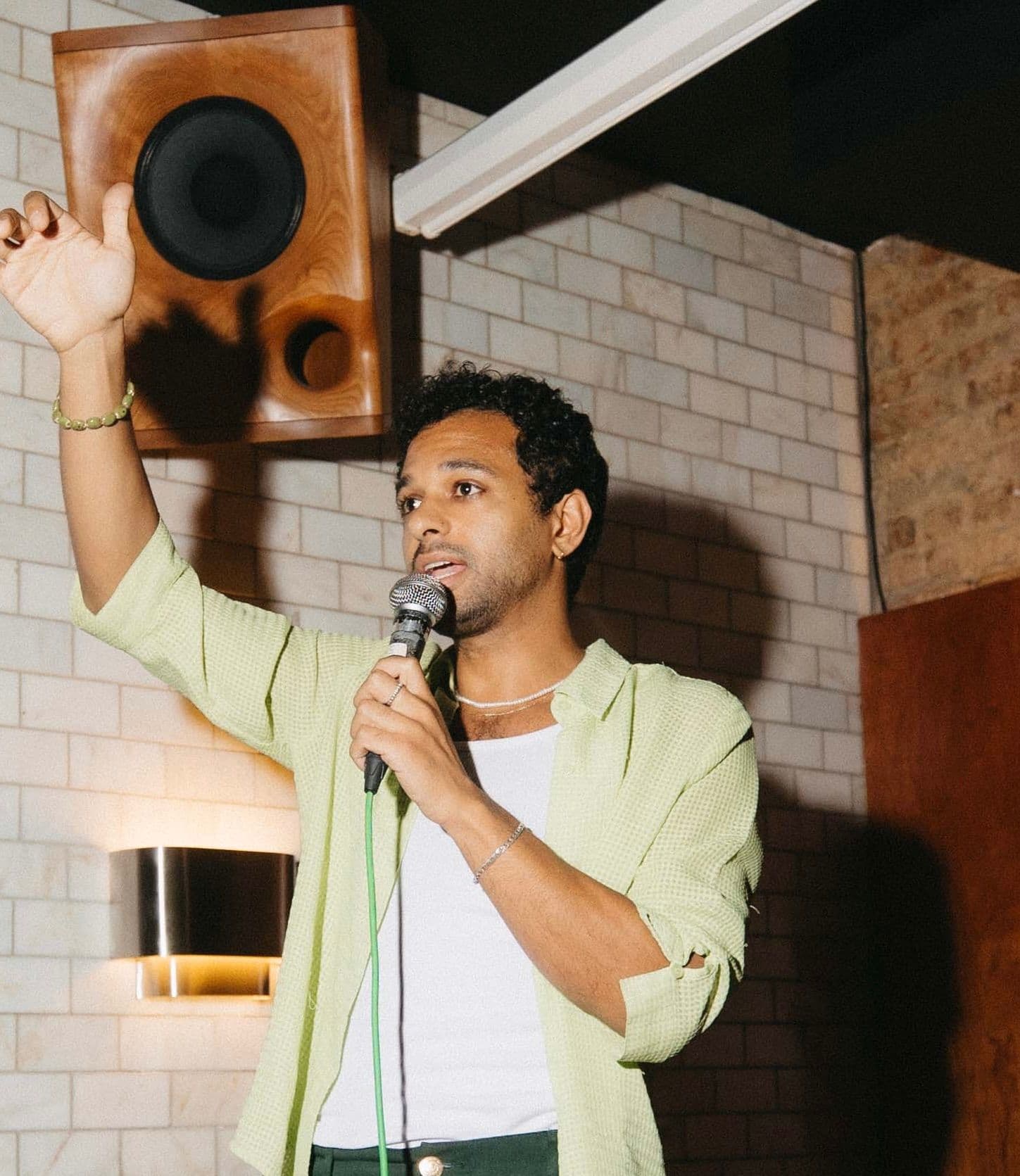 Omar Etman with microphone